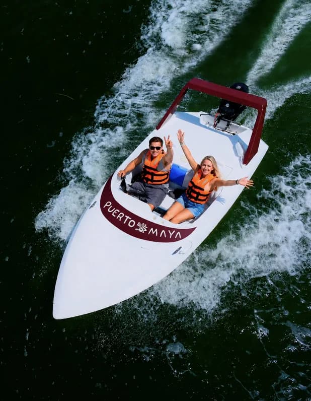 A Puerto Maya speedboat viewed from above in Cancun waters.